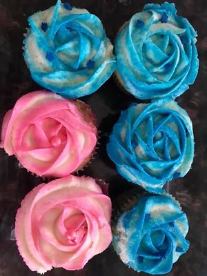 Colorful rosettes vanilla cupcakes  at Vegandreamz in Highlands Ranch