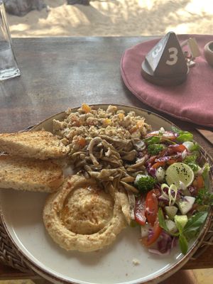Breakfast platter (scrambled tofu, hummus, salad & bread) with sauteed mushrooms added. #Veganuary at Atmosfera Restaurant  in Tangalle