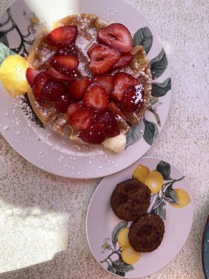 Vegan (gluten free) waffle with strawberries, and vegetarian (Morning star) sausage  at Malia's Cafe in Ocean City