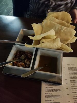 Poppadoms with chutneys at Indique in Manchester