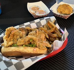 Oyster Mushroom Po Boy, House Sauce, Fried Green Tomatoes   at Vegan House Shack Kitchen @ Planted by Faith in Greenville