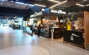 Exterior and seating area to the left and right of the restaurant at Bombay Express in Vienna