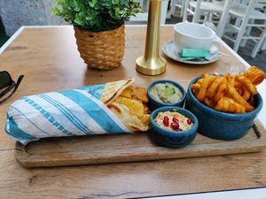 Veganos with Curly Fries & twi dips, Melitzana & Hummus at GRECO in St Gallen