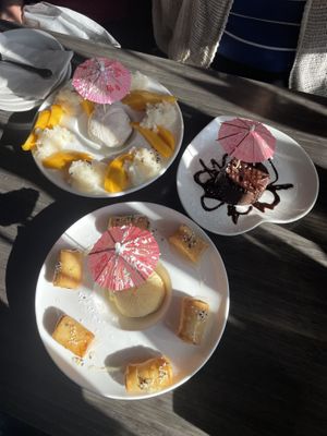 Mango sticky rice, lava cake, fried banana   at Plumeria in San Diego