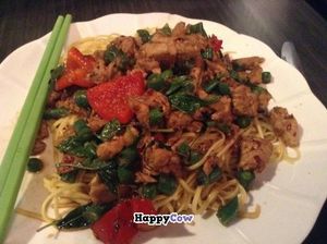 Veg Chicken Ka Pow with yellow noodles.  Spicy and tasty with a lot of holy basil.  Yum! at Plumeria in San Diego