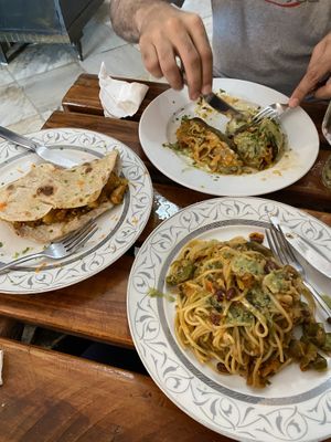Eggplant at the top (my dad was enjoying it too much for me to get a pic before lol), tacos on the left and spaghetti at the bottom  at El Shamuskiao in Havana