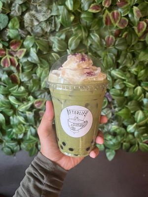 Matcha milk tea with boba, ube dust, & whip cream at Afterlife Tea and Boba Room in Las Vegas