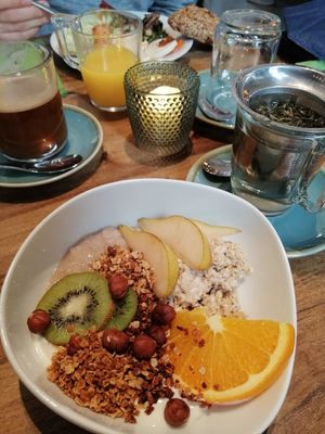 Choices of granola, fruits, oats, milk rice and similar at Bistro Bardot in Berlin
