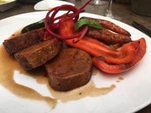 seitan and roasted potatoes in a tasty sauce at Bistro Bardot in Berlin