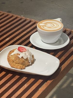 Strawberry scone and oat milk mocha  at Presta Coffee Roasters in Tucson