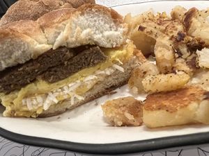 sausage egg & cheese + home fries   at The Local's Spot in Egg Harbor
