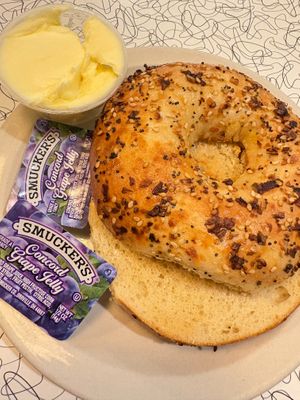 Everything bagel with vegan butter. Looks simple, but wow-that bagel was amazing! I'd like to buy some to take home, they're that good! at The Local's Spot in Egg Harbor
