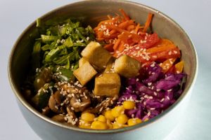 Vegan poke: thai rice, bell peppers in tahini paste, smashed cucumbers with chili peppers in soy sauce, veggies with tobasco sauce, corn, fried mushrooms and tofu at TUF Club in Yerevan