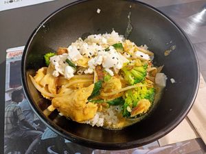 Tofu and heura (vegan meat) curry rice at UDON - Viapol in Sevilla