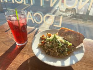 Josh’s pasta dinner and herbal hibiscus iced tea.  at Solar Harvests in East Greenville
