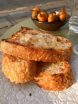 Sourdough, with Stuffed Padron Peppers lurking in the background  at Palmito in Hove