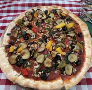 Vegetarian pizza without cheese, added eggplant   at Dok Mai Lao Trattoria Italiana in Pakse
