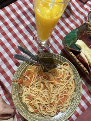 spaghetti pomodoro and mango shake  at Dok Mai Lao Trattoria Italiana in Pakse
