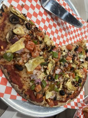 Plant based vegan nation pizza on cauliflower crust   at Pizza Twist in Modesto