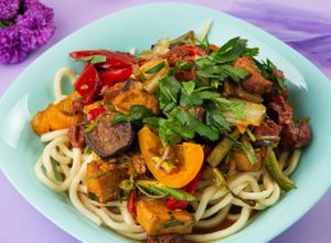 Vegan lagman: vegan dough, fried tofu, bell pepper, jando, chinese cabbage, celery, onion, garlic, spices at Fibonacci in Almaty