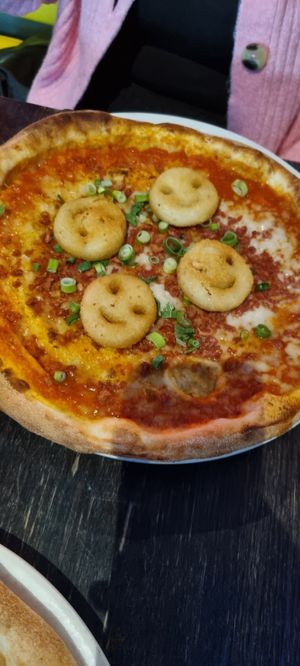 Haggis ans smiley faces pizza at Nonna Said in Glasgow