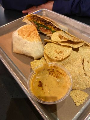 Crunch Wrap & Chips & Queso at Vegan Vibrationz in Plano