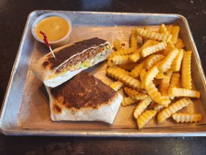 Crunch wrap and fries at Vegan Vibrationz in Plano