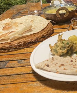 Roti, yellow lentil dal with tomatoes , Pakora (fried veggie fritter)  at Sitar Indian & Thai in Sigatoka