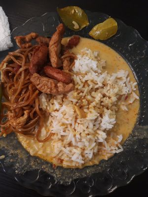 Not the best photo, but the best yellow curry of my life with pad thai and laab on the side. 😍 at Peace Kitchen - Kallio in Helsinki