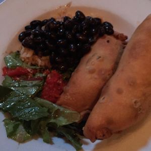 spinach & mushroom empanadas with the best black beans I've ever had at The Conquistador Lounge in Portland