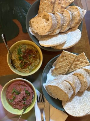 Eggplant dip and (garlicky) beet hummus with bread basket  at Gira Sol in Tomar