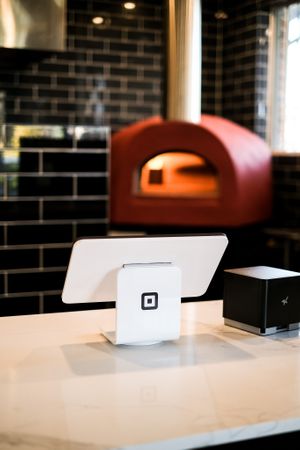 Experience a fresh and modern dining ambiance at our new restaurant, complete with a pristine interior and a wood-fired style oven for delectable dishes at Papa G's Pizzeria in Blacktown