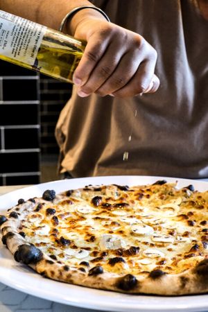 Get ready to try the incredible flavours of our vegetarian and vegan woodfired style pizza, including mushroom and truffle. at Papa G's Pizzeria in Blacktown