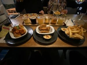 A flight of beer and a flight of food (bigger portions than expected, friends chomped most of my fries for me!)  at Babel Beerhouse in North London
