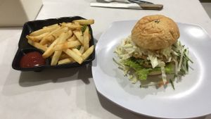 Burger and chips  at Loving Hut - Malioboro in 