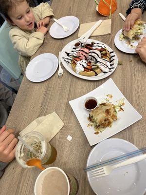 Waffle with ice cream was exciting  at Happiness Cafe in San Jose