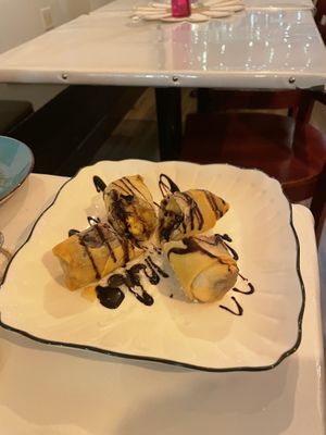 Banana spring rolls, fried banana with coconut and chocolate 🍫🍌🥥.  at Vegan Plate in Chicago
