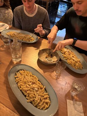 Three massive carbonaras for scale!  at don Fred in Newtown