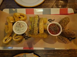 Calamari: subtle seafood smell, great taste, very crispy, good sauce; Zucchini fritte: moist inside, crispy outside; Suppli: similar to arancini, little bland, good sauce at don Fred in Newtown