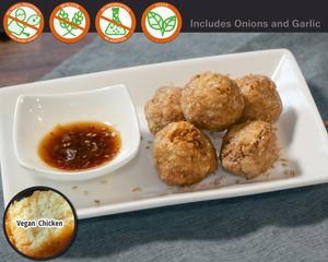 Tofu Meatballs marinated with an orignial blend of spices! Choose between a number of our homemade sauces to dip with (Teriyaki, sweet chilli, Wostishire) at Vegetiger オヤサイキッチン  TORAYA VEGETIGER SECOND-ROOM in Nagoya