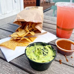 Chips and guacamole with strawberry Agua Fresca   at Rico Rico Vegano in Oakland