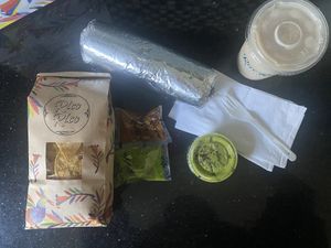 Aerial View of Food - Al Pastor Vegan Burrito w/Chips   at Rico Rico Vegano in Oakland