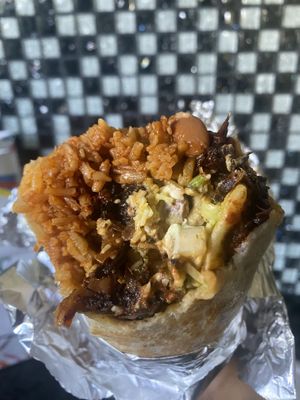 Pro: Generous Portion Con: Too Messy/Spicy for My Liking. Some odd textures. Couldn’t Finish. 😔 Didn’t Like the Al Pastor Burrito. That was my bad.  at Rico Rico Vegano in Oakland