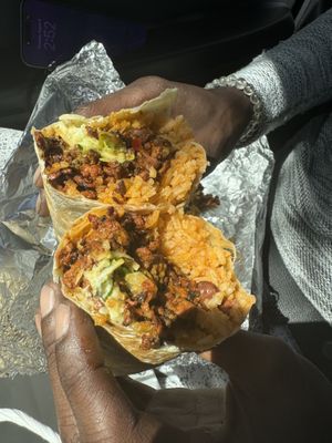Soyrizo burrito with light onion   at Rico Rico Vegano in Oakland