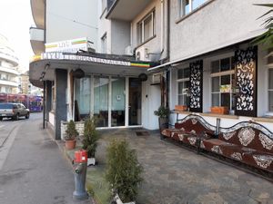 Exterior and outdoor seating (in winter) at Liyu in Zurich