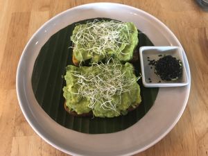 Avocado on pumpkin bread at Living Food Lab Canggu in Canggu