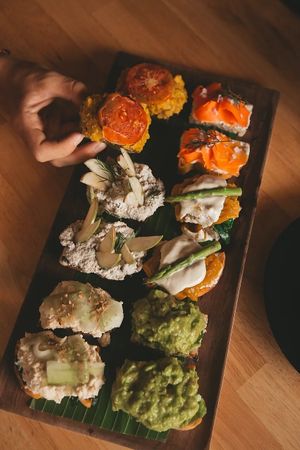 These mini toasts are topped with hummus, avocado, Not Salmon, Not Tuna, Scrambled Tofu and Not Egg Benedict.

Photo credit to the beautiful @ohmychayka on IG at Living Food Lab Canggu in Canggu