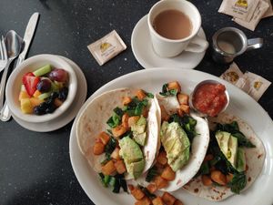 Breakfast tacos, coffee, and fruit at Monument Cafe in Georgetown