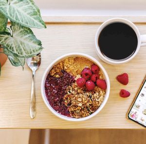 Raspberry crunch bowl - sweet oat base, almond butter, raspberry compote, granola, fresh raspberries, and honey  at Wild Valentine in Portsmouth