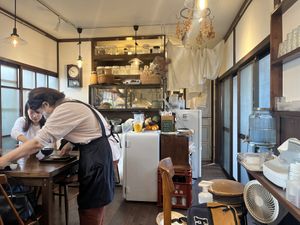 Dining area and kitchen   at VEGAN CAFE Kiu 喜雨 in Kobe